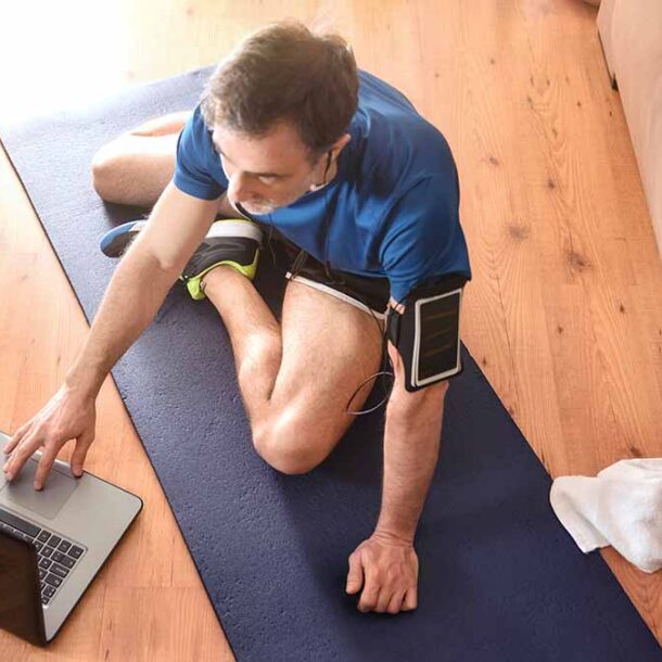 Man doing virtual home workout