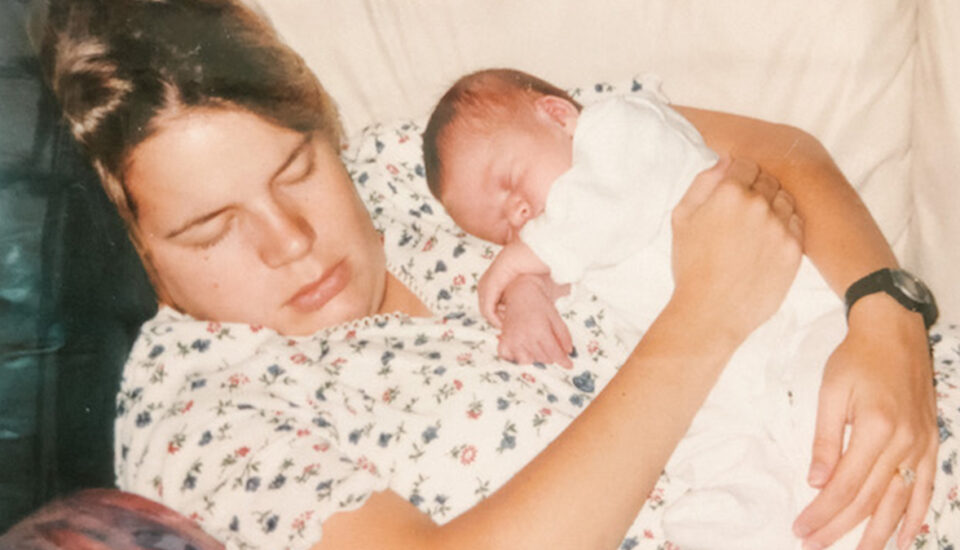 Jill Lewis sleeping with newborn baby